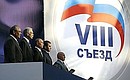 At the United Russia Party Congress. From left to right: President of Tatarstan Mintimer Shaimiev, Chairman of the State Duma Boris Gryzlov, President of Russia Vladimir Putin, Emergency Situations Minister Sergei Shoigu, and Mayor of Moscow Yury Luzhkov.