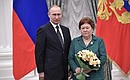 Presentation of state decorations. Liza Agadullina, teacher at Lyceum No. 42 in Ufa, Republic of Bashkortostan, is awarded the honorary title National Teacher of the Russian Federation.