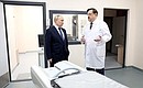 During a visit to the cancer centre in the Kaliningrad Region. With acting Chief Medical Officer Kirill Barinov.