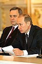 President Putin and Prime Minister Mikhail Kasyanov during a meeting of the State Council.