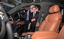 President of Egypt Abdel Fattah el-Sisi admiring the new Russian Aurus. General Director of NAMI Central Scientific Research Automobile and Automotive Engines Institute Sergei Gaisin gives explanations.