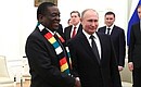 With President of the Republic of Zimbabwe Emmerson Mnangagwa.