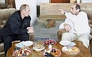 Russian President Vladimir Putin and Armenian President Robert Kocharian at an informal meeting.