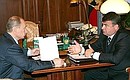 With Defence Minister Anatoly Serdyukov.