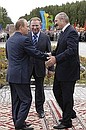 At the opening of the International youth festival ”Friendship-2004“. With the Presidents of Ukraine and Belarus, Leonid Kuchma and Alexander Lukashenko.