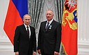 Presenting Russian Federation state decorations. The Order of Friendship is awarded to Kirov agricultural production cooperative mechanic and tractor driver Andrei Gergert.