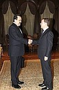 С премьер-министром Казахстана Каримом Масимовым.
