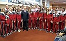 During a visit to specialised sports school training young Olympic athletes. With members of Team Russia at the 2014 Summer Youth Olympics.