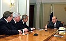 President Putin with Chairman of the Higher Arbitration Court Veniamin Yakovlev (left), Chairman of the Supreme Court Vyacheslav Lebedev (second from left) and Chairman of the Constitutional Court Valery Zorkin.
