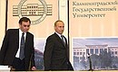 President Putin before a meeting with students of Kaliningrad State University. Left: Rector of the university Andrei Klemeshev.