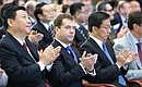 С Заместителем Председателя Китайской Народной Республики Си Цзиньпином (слева) на открытии Дня России на выставке «ЭКСПО-2010».
