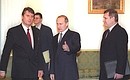 With Ukrainian Prime Minister Viktor Yushchenko (left) and Russian First Deputy Prime Minister Mikhail Kasyanov.