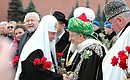 Patriarch Kirill of Moscow and All Russia and Chairman of the Central Spiritual Directorate of Muslims of Russia and Chief Mufti of Russia Talgat Tadzhuddin at the flower-laying ceremony at the monument to Kuzma Minin and Dmitry Pozharsky on Red Square.