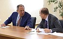 Before the start of a meeting with permanent members of the Security Council. Foreign Minister Sergei Lavrov (left) and Director of the Federal Security Service Alexander Bortnikov.