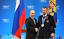 Meeting with XI Winter Paralympics medallists. Alexei Lysov, silver medallist in sledge hockey, was awarded the Medal of the Order for Services to the Fatherland I degree.
