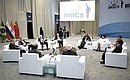 Встреча лидеров БРИКС по вопросам развития БРИКС и приоритетов стратегического партнёрства.