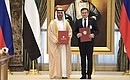 Exchange of documents signed during Vladimir Putin’s state visit to the United Arab Emirates.