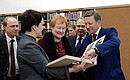 Chief of Staff of the Presidential Executive Office Sergei Ivanov and former President of Finland Tarja Halonen at Vyborg Public Central Library. Photo:Press Office of the Leningrad Region Governor
