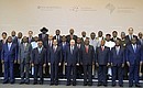 The heads of delegations attending the Russia-Africa Summit pose for photographs.