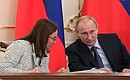 With Presidential Aide Elvira Nabiullina at a meeting of the Commission for Strategic Development of the Fuel and Energy Sector and Environmental Security.