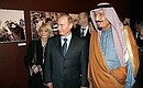 At the photo exhibition, Russia: the Country and the People. With Head, Editor-in-Chief of the RIA Novosti information agency Svetlana Mironyuk and Prince Salman bin Abdul Aziz.