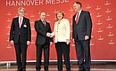 At the opening of the Hannover Messe 2013. With German Federal Chancellor Angela Merkel, Prime Minister of Lower Saxony Stephan Weil, and Rittal CEO Friedhelm Loh.