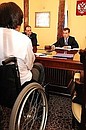 На совещании по дополнительным мерам социальной поддержки лиц, осуществляющих уход за детьми-инвалидами и другими нетрудоспособными гражданами.
