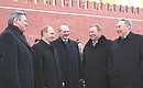Left to right: Prime Minister Mikhail Kasyanov, President Putin, Belarusian President Alexander Lukashenko, Ukrainian President Leonid Kuchma and Kazakh President Nursultan Nazarbayev.