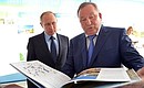 Before the State Council Presidium meeting, Vladimir Putin inspected development plans for a new resort, Belokurikha-2. With Altai Territory Governor Alexander Karlin.