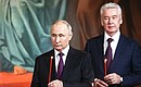 With Moscow Mayor Sergei Sobyanin at Easter service at the Christ the Saviour Cathedral. Photo: Sergei Karpukhin, TASS
