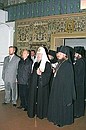 President Putin visiting one of the churches of the Solovetsky Saviour-Transfiguration Monastery with Patriarch of Moscow and All Russia Alexii II.