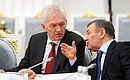 Chairman of the Board of Directors of the Continental Hockey League Gennady Timchenko (left) and President of Dinamo Hockey Club (Moscow) Arkady Rotenberg at a meeting of the Council for the Development of Physical Culture and Sport.