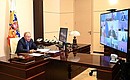 At a meeting with Government members (via videoconference).