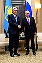 С Президентом Казахстана Касым-Жомартом Токаевым. Фото: Павел Бедняков, РИА «Новости»