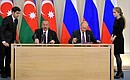 Vladimir Putin and Ilham Aliyev sign the Joint Statement on the Priority Areas of Economic Cooperation between Russia and Azerbaijan.