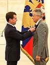 Ceremony awarding state decorations. Luciano Massetti, head of aviation at the Italian Civil Defence Department, was awarded the Order of Courage.
