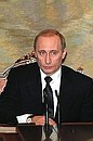 President Putin at a meeting discussing the situation in Iraq.