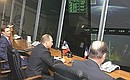 President Putin with French President Jacques Chirac at the Main Space Test and Control Centre.