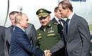 During a visit to the Russian Defence Ministry’s Chkalov State Flight Test Centre. With Minister of Industry and Trade Denis Manturov (right) and Defence Minister Sergei Shoigu.
