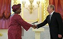Ambassador of Burkina Faso Marie Odile Bonkongu presents her letter of credence to Vladimir Putin.