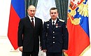 Major Oleg Kogutnitsky, commander of a helicopter unit, was awarded the Order of Courage.