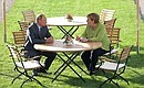 Перед началом российско-германских переговоров. Неформальная беседа с канцлером ФРГ Ангелой Меркель.