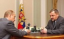 President Putin meeting with the head of the Chechen Administration, Akhmad Kadyrov.