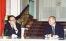 President Putin with Chinese President Jiang Zemin at a news conference following Russian-Chinese negotiations.