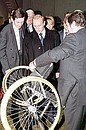 Vladimir Putin at the Centre for the Production of Prosthetic and Orthopaedic Equipment of the RSC Energia\'s experimental engineering plant. An exhibition of Russian-made equipment for the disabled.