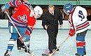 President Vladimir Putin with participants in an inter-regional junior ice hockey championship.