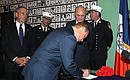 President Putin signing the visitors\' book at the Academy of Fire Science.
