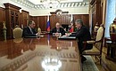 Встреча с Министром обороны Сергеем Шойгу (справа) и Министром иностранных дел Сергеем Лавровым.