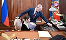 Vladimir Putin met in the Kremlin with eight-year-old Raisat Akipova and her family from the Republic of Daghestan.