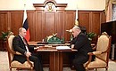 С руководителем Федеральной налоговой службы Михаилом Мишустиным.